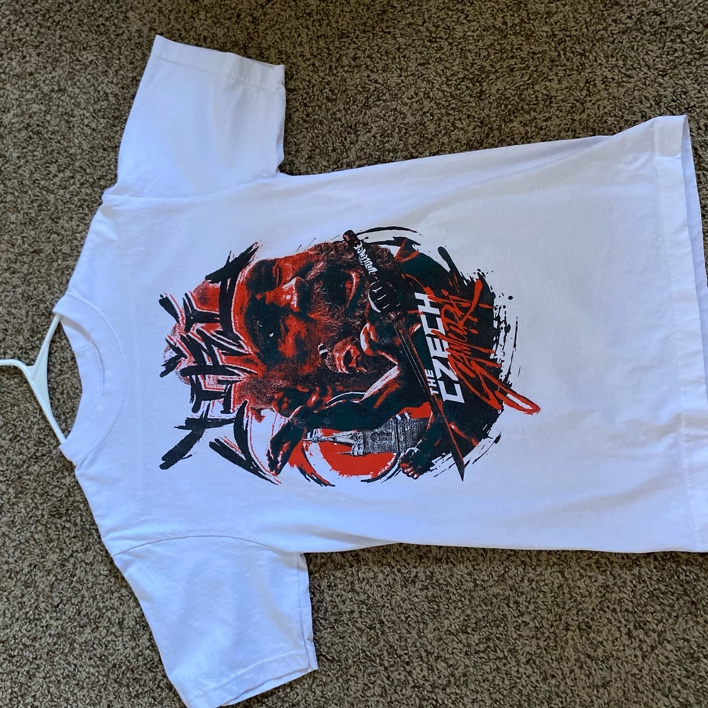 Jiří Procházka full violence

White Graphic T-Shirt with Red and Black Design